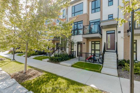 Photo 2 at TH203 - 90 Canon Jackson Drive, Amesbury, Toronto
