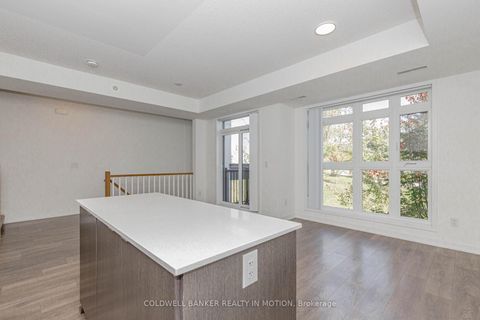 Photo 21 at TH203 - 90 Canon Jackson Drive, Amesbury, Toronto