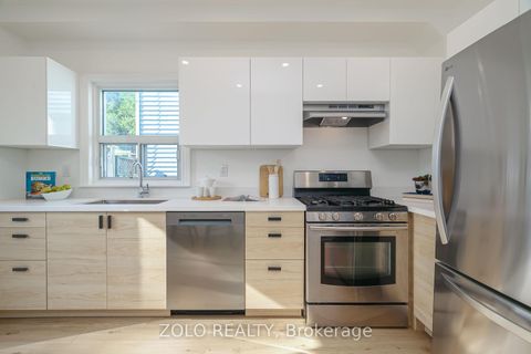 Photo 10 at 24 Poucher Street, Jones, Toronto