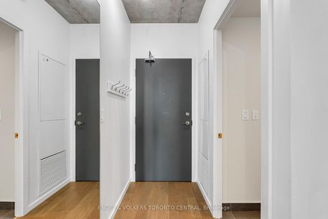 Photo 2 at 310 - 21 Lawren Harris Square, Moss Park, Toronto