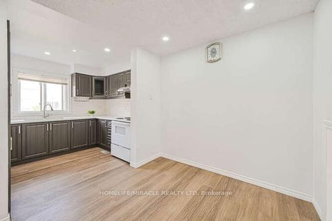 Photo 5 at 48 - 2012 Martingrove Road W, Clairville, Toronto
