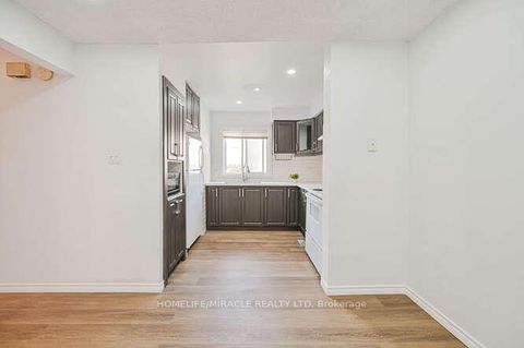 Photo 6 at 48 - 2012 Martingrove Road W, Clairville, Toronto