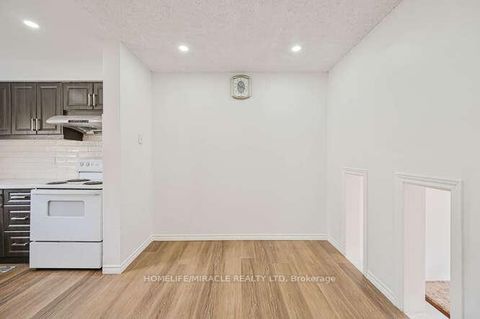 Photo 8 at 48 - 2012 Martingrove Road W, Clairville, Toronto