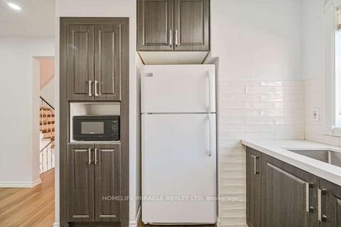 Photo 12 at 48 - 2012 Martingrove Road W, Clairville, Toronto