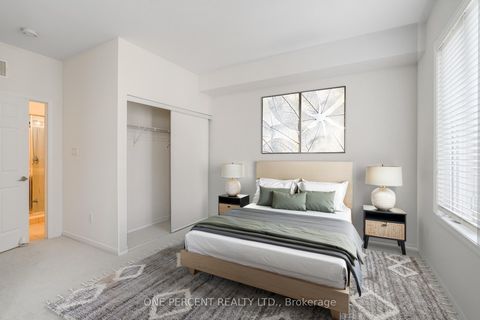 Photo 1 at 12 - 25 Coneflower Crescent, Branson, Toronto