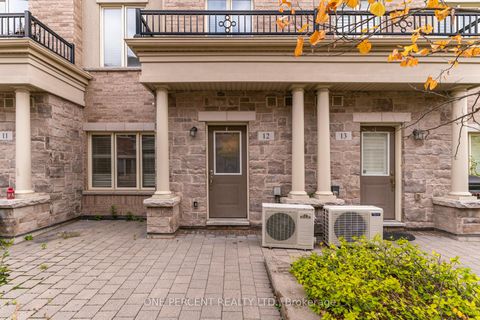 Photo 3 at 12 - 25 Coneflower Crescent, Branson, Toronto