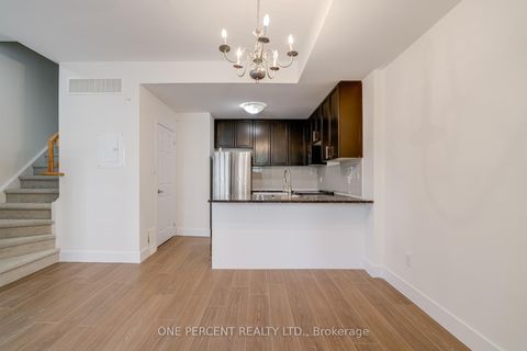 Photo 5 at 12 - 25 Coneflower Crescent, Branson, Toronto