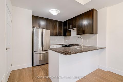 Photo 7 at 12 - 25 Coneflower Crescent, Branson, Toronto
