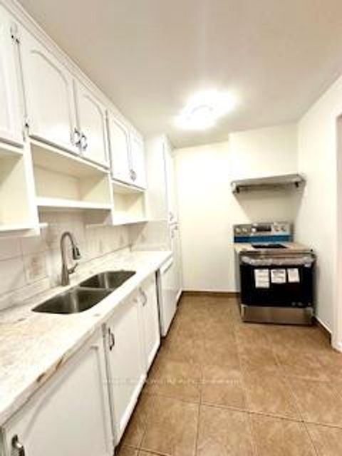 Photo 11 at 211 - 335 Driftwood Avenue, Black Creek, Toronto