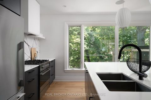 Photo 3 at 5 Wembley Drive, Woodbine Corridor, Toronto