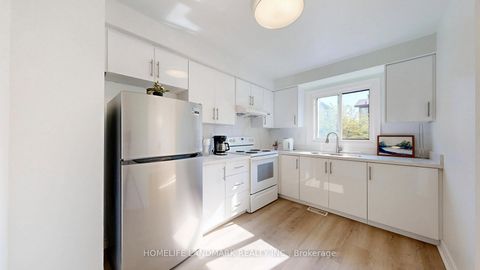 Photo 10 at 19 Fundy Bay Boulevard, Steeles, Toronto