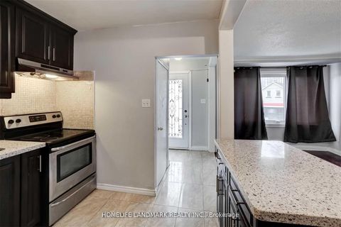 Photo 2 at 67 Bala Avenue, Mount Dennis, Toronto