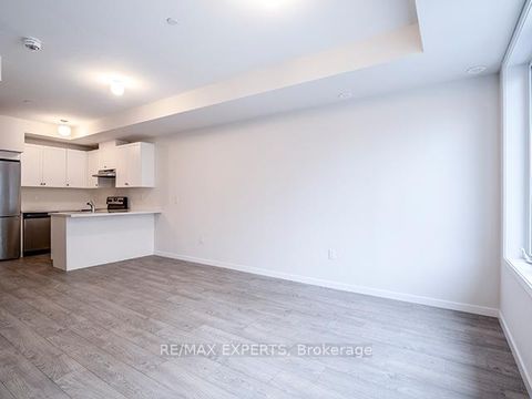 Photo 2 at 61 - 300 Alex Gardner Circle, Aurora Village, Aurora