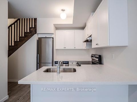 Photo 6 at 61 - 300 Alex Gardner Circle, Aurora Village, Aurora