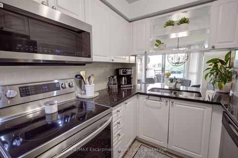 Photo 7 at 311 - 2325 Central Park Drive, RO River Oaks, Oakville