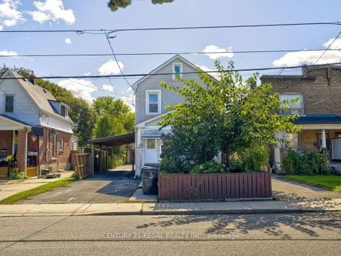 Photo 1 at 11 Midburn Avenue, Crescent Town, Toronto