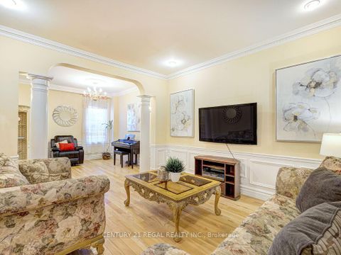 Photo 5 at 11 Midburn Avenue, Crescent Town, Toronto