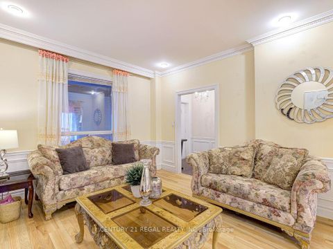 Photo 6 at 11 Midburn Avenue, Crescent Town, Toronto