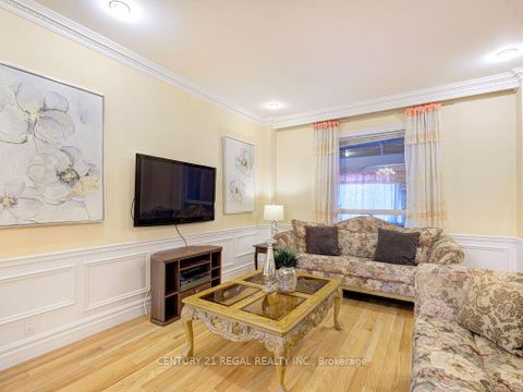 Photo 7 at 11 Midburn Avenue, Crescent Town, Toronto