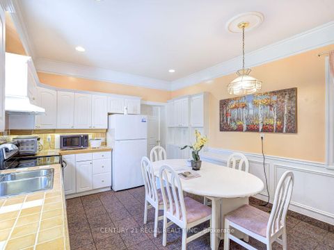 Photo 11 at 11 Midburn Avenue, Crescent Town, Toronto