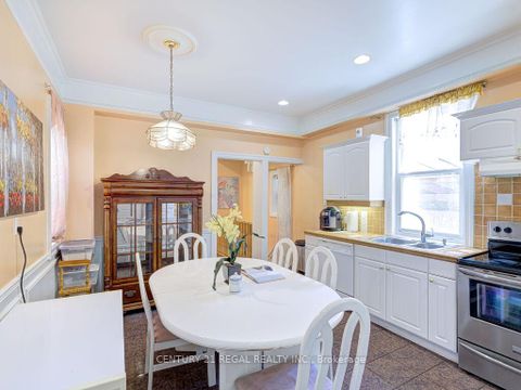 Photo 12 at 11 Midburn Avenue, Crescent Town, Toronto