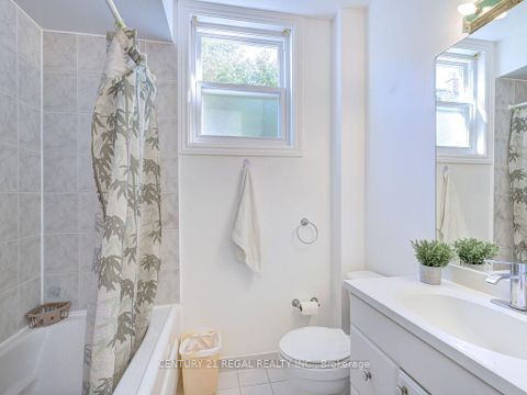 Photo 14 at 11 Midburn Avenue, Crescent Town, Toronto
