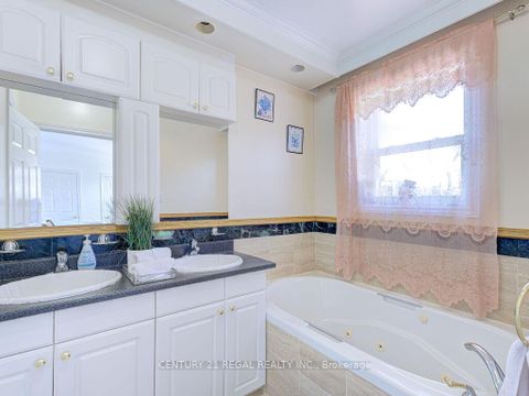 Photo 19 at 11 Midburn Avenue, Crescent Town, Toronto