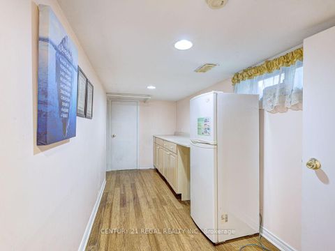 Photo 25 at 11 Midburn Avenue, Crescent Town, Toronto