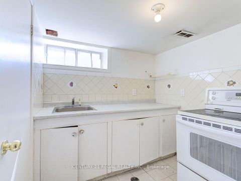 Photo 28 at 11 Midburn Avenue, Crescent Town, Toronto