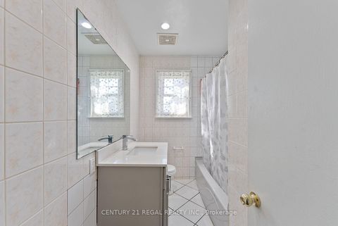 Photo 20 at 106 FLORA Drive, Dorset Park, Toronto