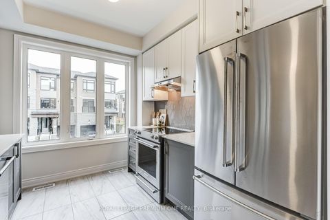 Photo 25 at 67 TENNANT Circle, Vellore Village, Vaughan