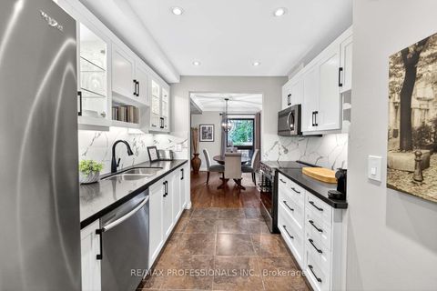 Photo 15 at 1 - 4357 Bloor Street W, Markland Wood, Toronto