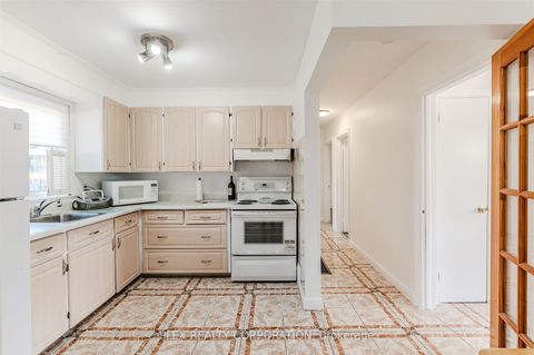 Photo 4 at 52 Merrian Road, Kennedy Park, Toronto