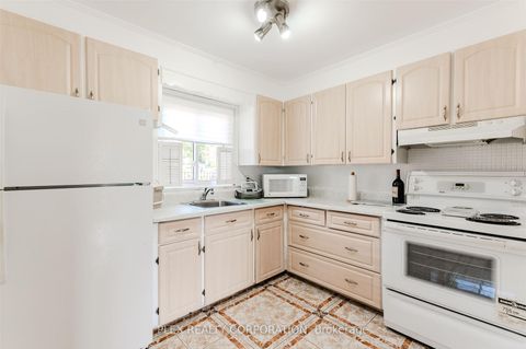 Photo 5 at 52 Merrian Road, Kennedy Park, Toronto