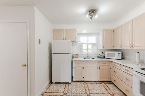 Photo 6 at 52 Merrian Road, Kennedy Park, Toronto