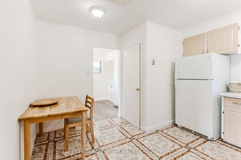 Photo 7 at 52 Merrian Road, Kennedy Park, Toronto