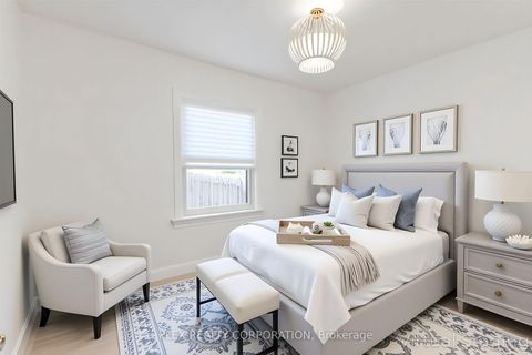 Photo 9 at 52 Merrian Road, Kennedy Park, Toronto