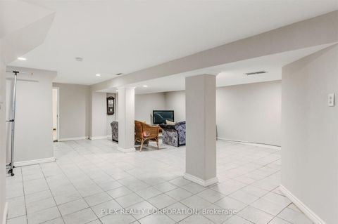 Photo 11 at 52 Merrian Road, Kennedy Park, Toronto