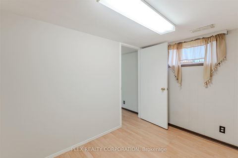 Photo 15 at 52 Merrian Road, Kennedy Park, Toronto