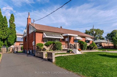 Photo 22 at 52 Merrian Road, Kennedy Park, Toronto