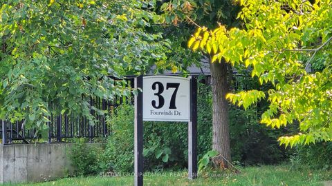 Photo 1 at 91 - 37 Four Winds Drive, York University Heights, Toronto