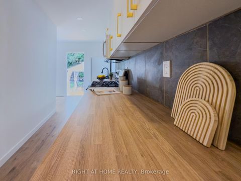 Photo 9 at 32 Brenton Street, Crescent Town, Toronto