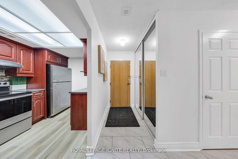 Photo 1 at 215 - 88 Alton Towers Circle, Milliken, Toronto