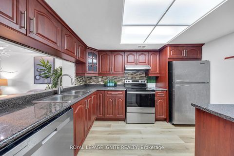 Photo 2 at 215 - 88 Alton Towers Circle, Milliken, Toronto