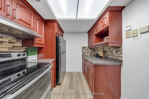 Photo 4 at 215 - 88 Alton Towers Circle, Milliken, Toronto