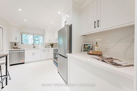 Photo 20 at 42 Davean Drive, Windfields, Toronto