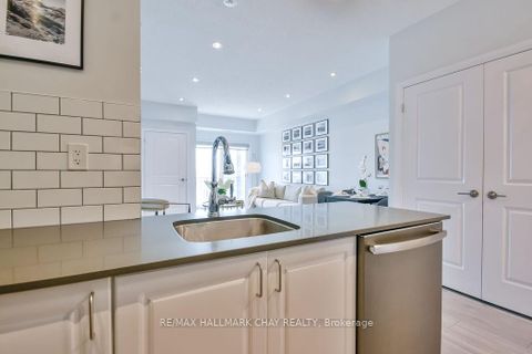 Photo 11 at 507 - 299 Cundles Road E, Alliance, Barrie