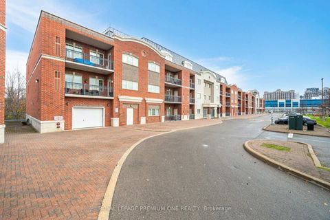 Photo 1 at 210 - 9451 Jane Street, Maple, Vaughan