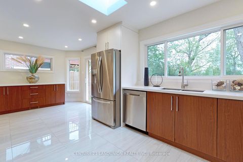 Photo 4 at 757 Huntingwood Drive, Sullivan, Toronto