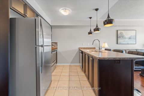 Photo 3 at 11 - 149 Isaac Devins Boulevard, Pelmo Park W5, Toronto